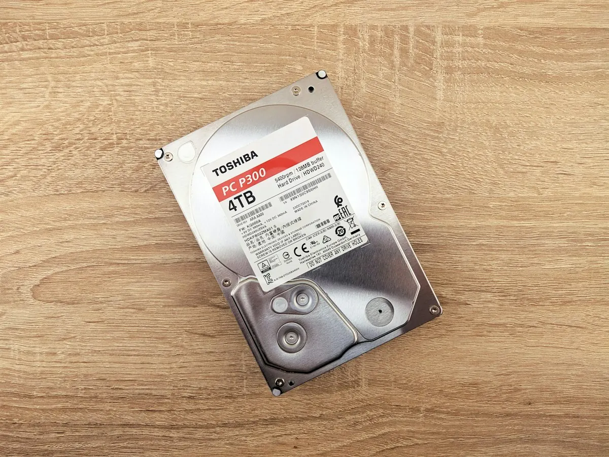 Hard disk drive lying on a wooden table
